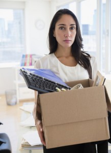 Woman packing up her stuff at the office
