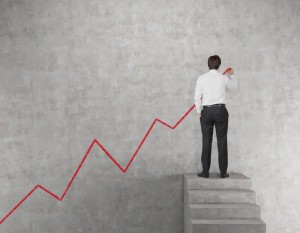 businessman drawing chart