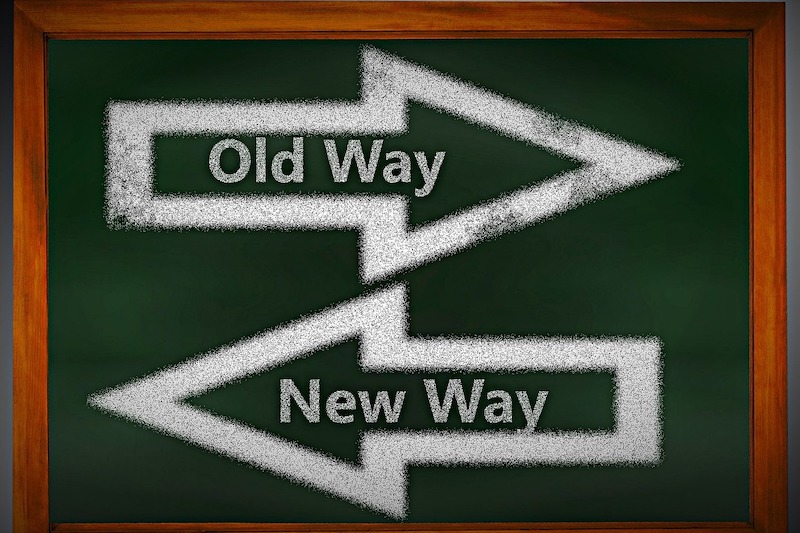 "Old Way, New Way" arrow signs