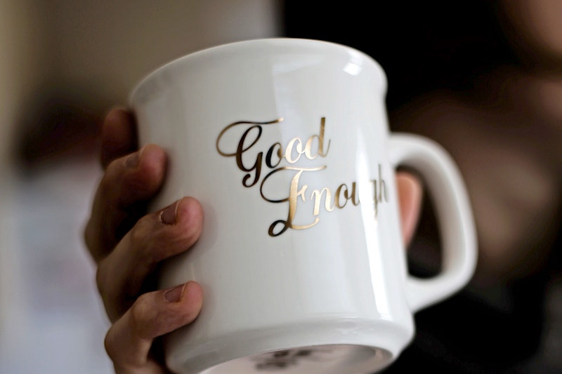 coffee mug representing benefits of an "enough-ist" mindset