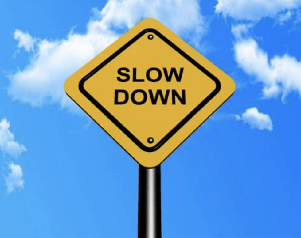 Slow Down traffic sign