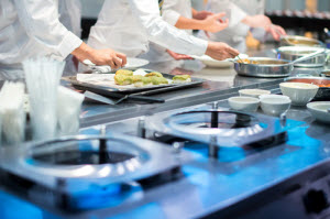 Chefs busy preparing the food