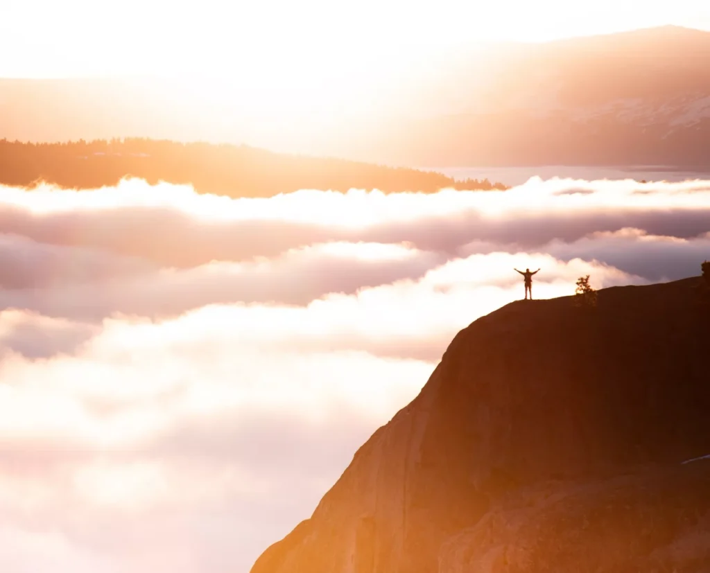 A person who reached the top of a mountain