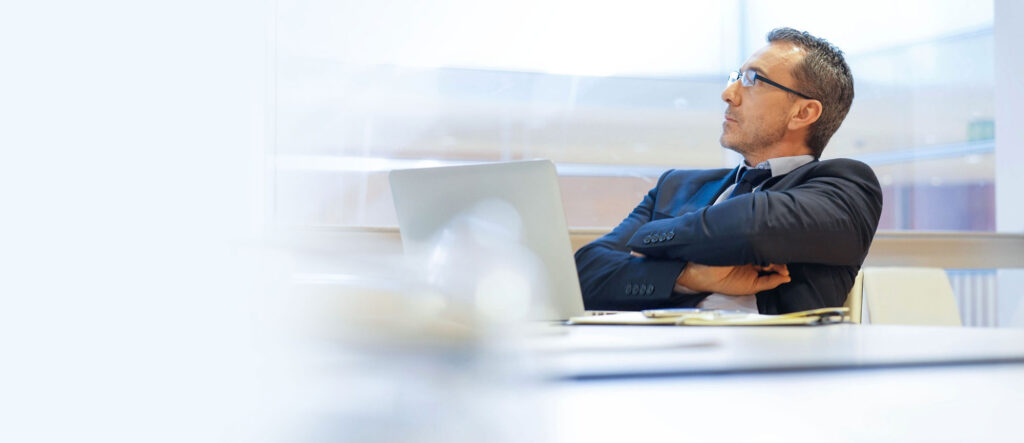 A person thinking of something at work