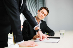 A boss explaining to his employee