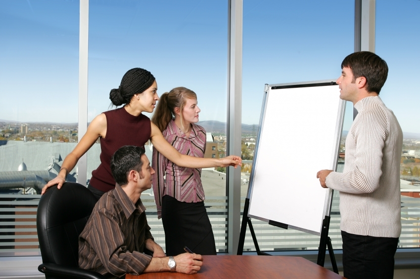 People discussing a presentation