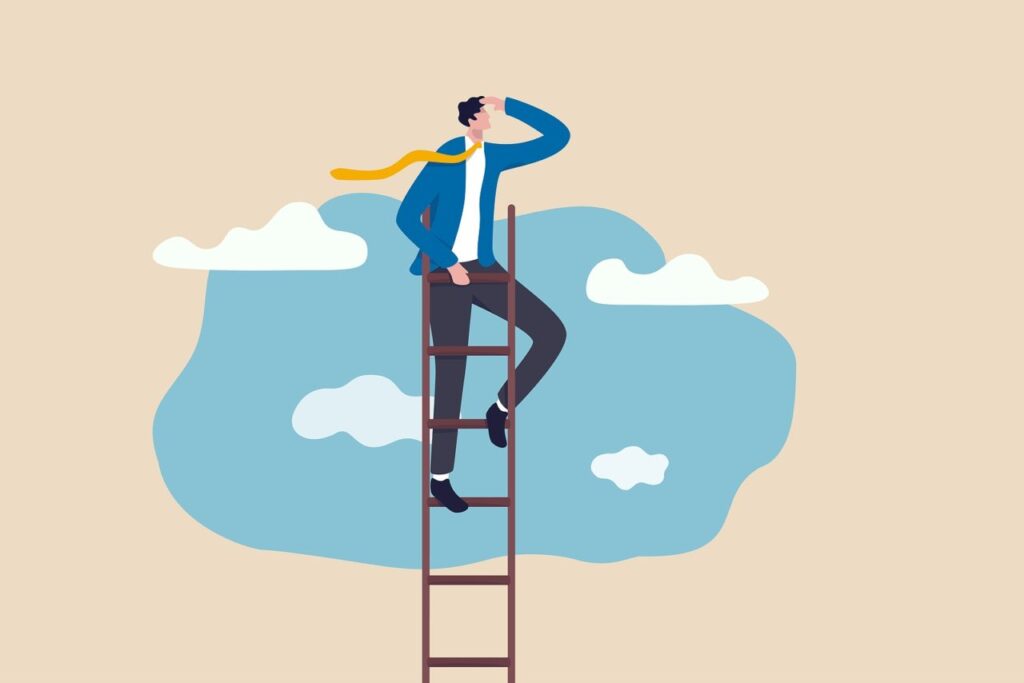 A man climbing up a leader