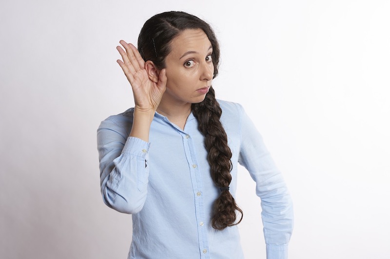 A woman trying to listen