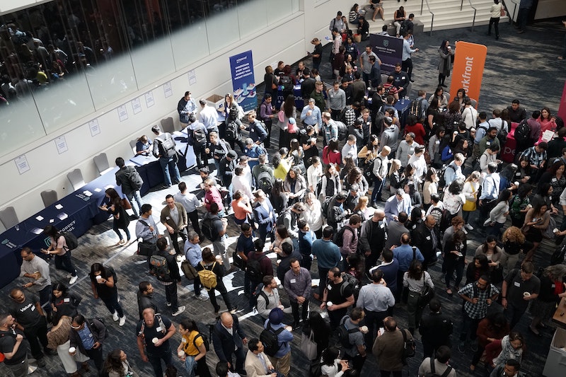 A crowd gathering at a conference