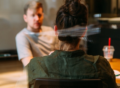 Two people talking to each other