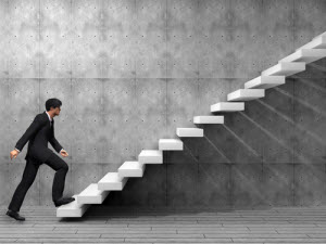 A leader walking up the stairs