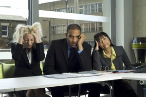 3 people looking frustrated