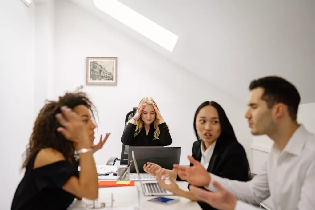 People arguing during a meeting