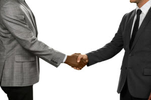 Two businessmen shaking hands